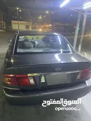  4 كيا اوبتيما 2002 بحالة جيدة للبيع (كاش)