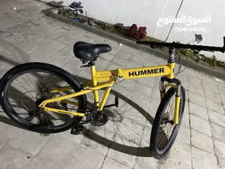  1 دراجة هوائية من شركة HUMMER مع خوذة اصلية جديدة وغطاء لكرسي الدراجة مجاناً