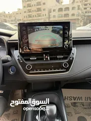  15 تويوتا كارولا ترخيص 2022 محرك 1800 هايبرد جير أوتوماتيك 170 حصان