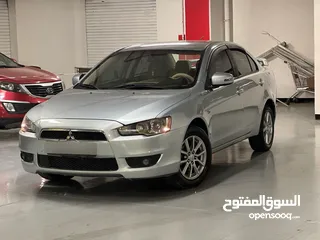  2 ميتسوبيشي لانسر 2016 كرت ابيض