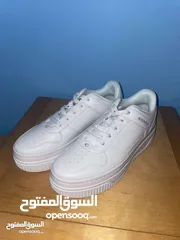  4 بوط عدد 2 ماركة كوتش جديد غير مستعمل باللون الاسود والابيض