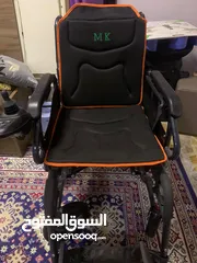  1 كرسي كهربائي للمقعدين