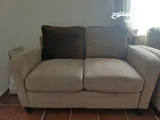  1 living room furniture. 2 sofa's