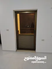  12 شقه فارغه للايجار جديده لم تسكن  ابونصير خلف مبنى امانه عمان