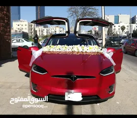  1 تيسلا جيب للأيجار شهري يومي لونيين ابيض وخمري جيب بسعر مغري واسعة من الداخل مارسيدس جي لاند كروز كشف