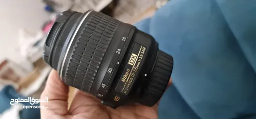  5 كاميرا نيكون D5200 كأنها جديده لم تستعمل عداد الشتر 7k + عدستين (18-55+55-200)