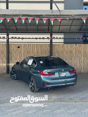  3 BMW 330e Sport 2021  Plug-in Hybrid  فحص كامل  كلين تايتل  جمرك جديد