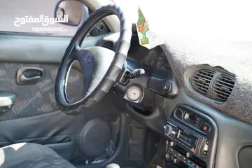  20 هونداي اكسنت هاتشباغ موديل 1998 لون ابيض   بسعر مغري و مميز جدددددا