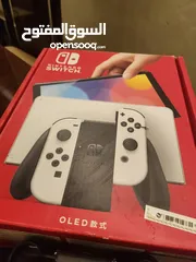  2 Nintendo switch with 2 games