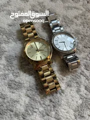  1 Michael Kors and Armani Exchange Women’s watches. Used but in good condition.