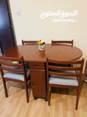  1 Wooden table with 4 chairs