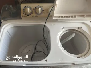  2 عرض نار شرار على غسالة نوع شارب