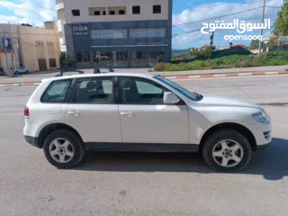  7 فولكس فاجن طوارق 2008 بحالة الوكالة  ماتور ديزل 3000 V6 عداد 145000 جير و ماتور و شصيات 100% وعلى ال