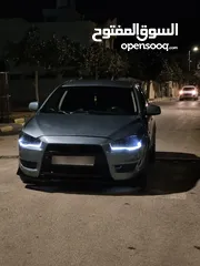 4 ميتسوبيشي فحص نظيف 100% موديل 2010 سياره كثير كثير ممتازه موتور 1005 جير موتور فحص 100% توماتيك المع