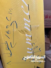  1 ماكنه خياطه سنجر مستعمله + طاولة كوي كبيره الحجم