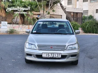  18 مستوبيشي لانسر 2003 محرك 1300جير عادي قتصادية جدا كاسير 4نجوم فحص كامل بسعر 4700