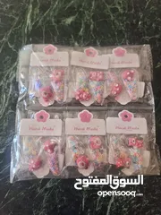  9 اكسسورات بسعر ه 90 درزن اشكال وانواع مختلفه مطلوب 500 دينار