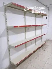  2 رفوف حائط + وسطي بحال لوكاله للبيع للجادين فقط الاتصال