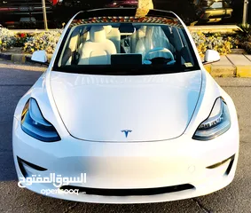  5 تيسلا 2021 model 3 فحص كامل 4 جـيـد فرش ابيض جنط 19بحالة الوكالة لون مميز للبيع بسعر لقطة ومحروووق