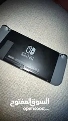  2 Nintendo switch! With game! Has some scratches and a crack.