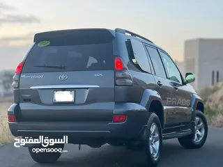  12 تويوتا برادو جيب موديل 2005  ليمتد من فحص كامل بحالة الشركة فل عدا الفتحة ممشى قليل لون فيراني بحالة