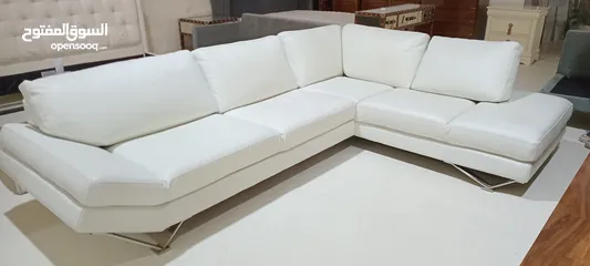  2 leather sectional sofa from natuzzi,   with excellent condition and free delivery all over United AE