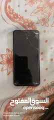  4 Redme note 5 plus black with headphones and a cover