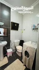  12 شقه طابق اول مع حديقه واسعه للبيع ابو نصير / مقابل الكليه البحريه
