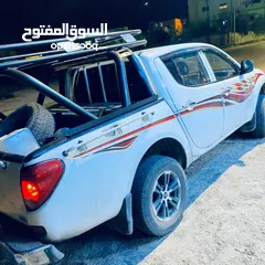  1 ميتسوبيشي بيك اب 4*4 L200