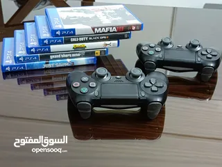  2 أيادي بلايستيشن اصلية والعاب للبيع