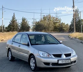  1 ميتسوبيشي لانسر 2010 فحص كامل بحالة الوكالة