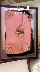  2 Gucci pink bamboo leather bag