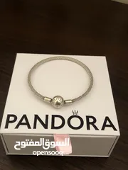  5 PANDORA bracelet, for sale, plus two charms as a gift. price for all 60 dinars