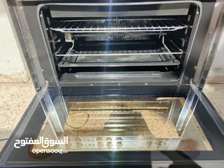  2 غاز تكنو ستانلس منفوض كامل 90سم فل سيفتي و كهربته شغالة (قدحة و شواي فرن و لمبة) مع مروحة تبريد فرن