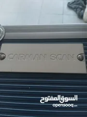  4 جهاز فحص سيارات  كومبيوتر وجهاز تنظيف بخاخات