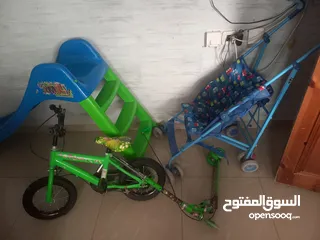  1 العاب للأطفال سكوترين مع عربايه للأطفال مع مرجيحة مع بسكليت بن تن