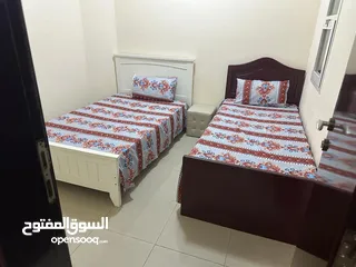  4 (md sabir )Two rooms and a hall, two bathrooms, a balcony overlooking the sea, furnished, in Sharjah