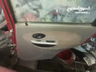 19 اربع ابواب وغطا امامي وغطا خلفي لشيري QQ 2006
