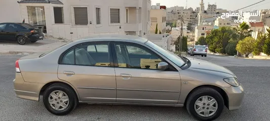  1 هوندا سيفك موديل 2005 فل عدا الفتحه  للبيع
