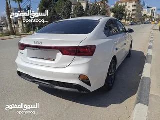  12 سيراتو k3 2022-2023 بنزين 8800 كيلومتر بحالة الوكالة  دهان الشركة الأصلي