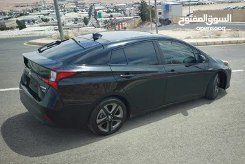 5 تويوتا بريوس 2022 XLE فحص كامل فل ما عدا الفتحة صنف بيرسونا TOYOTA PRIUS 2022 XLE FULLY LODED