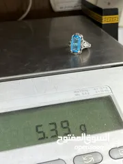  9 *خاتم فضة بحجر أكوامارين – عيار 925، وزن 5.4 جرام