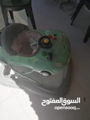  1 كرسي طعام +هزازه تشتغل على البطاريات السعر على التلفون+كراجه اطفال