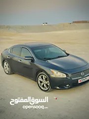  3 Nissan Maxima  Model 2012 Prize 2000 Kilometer 2215??