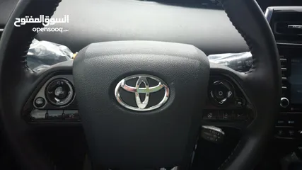  17 تويوتا بريوس 2022 XLE فحص كامل فل ما عدا الفتحة صنف بيرسونا TOYOTA PRIUS 2022 XLE FULLY LODED