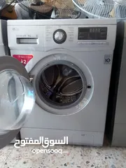  4 غسالة مع نشافة نوع ال جي