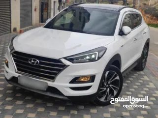  4 هونداي توسان بنزين فل مسكر اضافات دفع رباعي جيب بالكرتونة قطارة بالمصروف