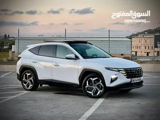  20 هونداي توسان/2022 Plug In فل الفل فتحة سقف بانوراما  4x4 ///271Hp   ( Haybrid) 1600cc