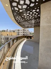  13 شقة طابق اخير مع روف 230 متر وتراس 100 متر على شارعين  طريق المطار خلف المدارس العالمية بسعر مميز