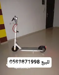  1 سكوتر كهرباء نوع اوكاي مع شاشه تحكم